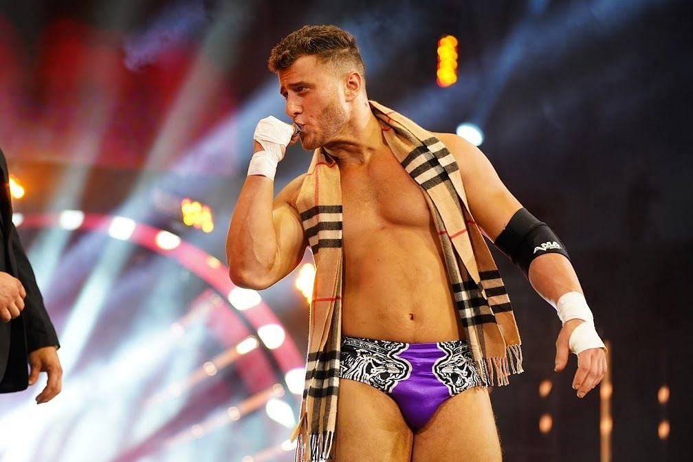 MJF kissing his Dynamite Diamond Ring at an AEW event.