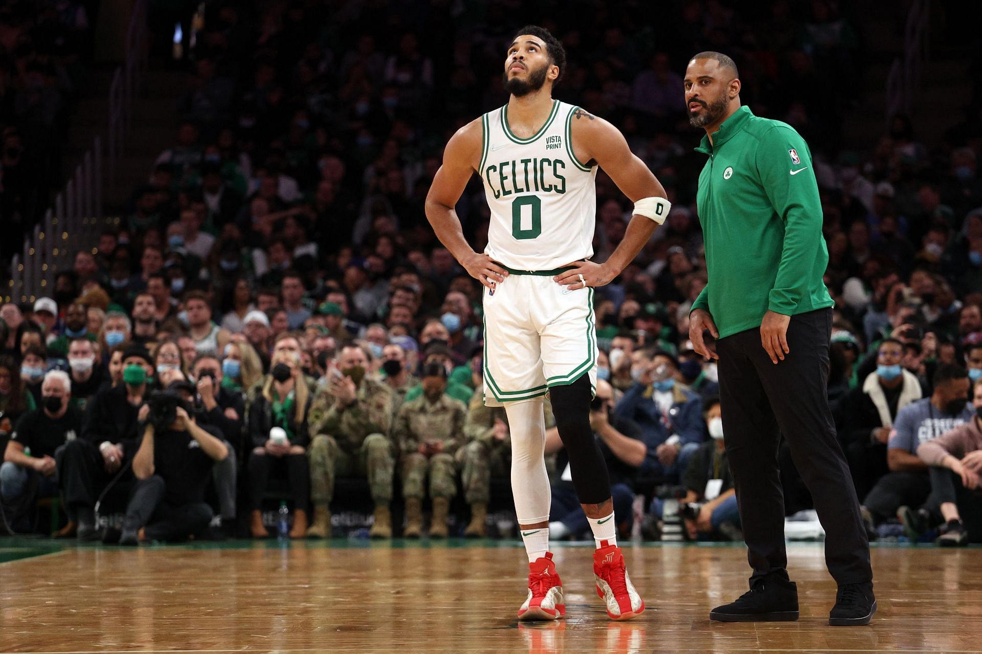 Jayson Tatum #0 of the Boston Celtics talks with head coach Ime Udoka during the second half of the game against the Toronto Raptors at TD Garden on November 10, 2021 in Boston, Massachusetts.