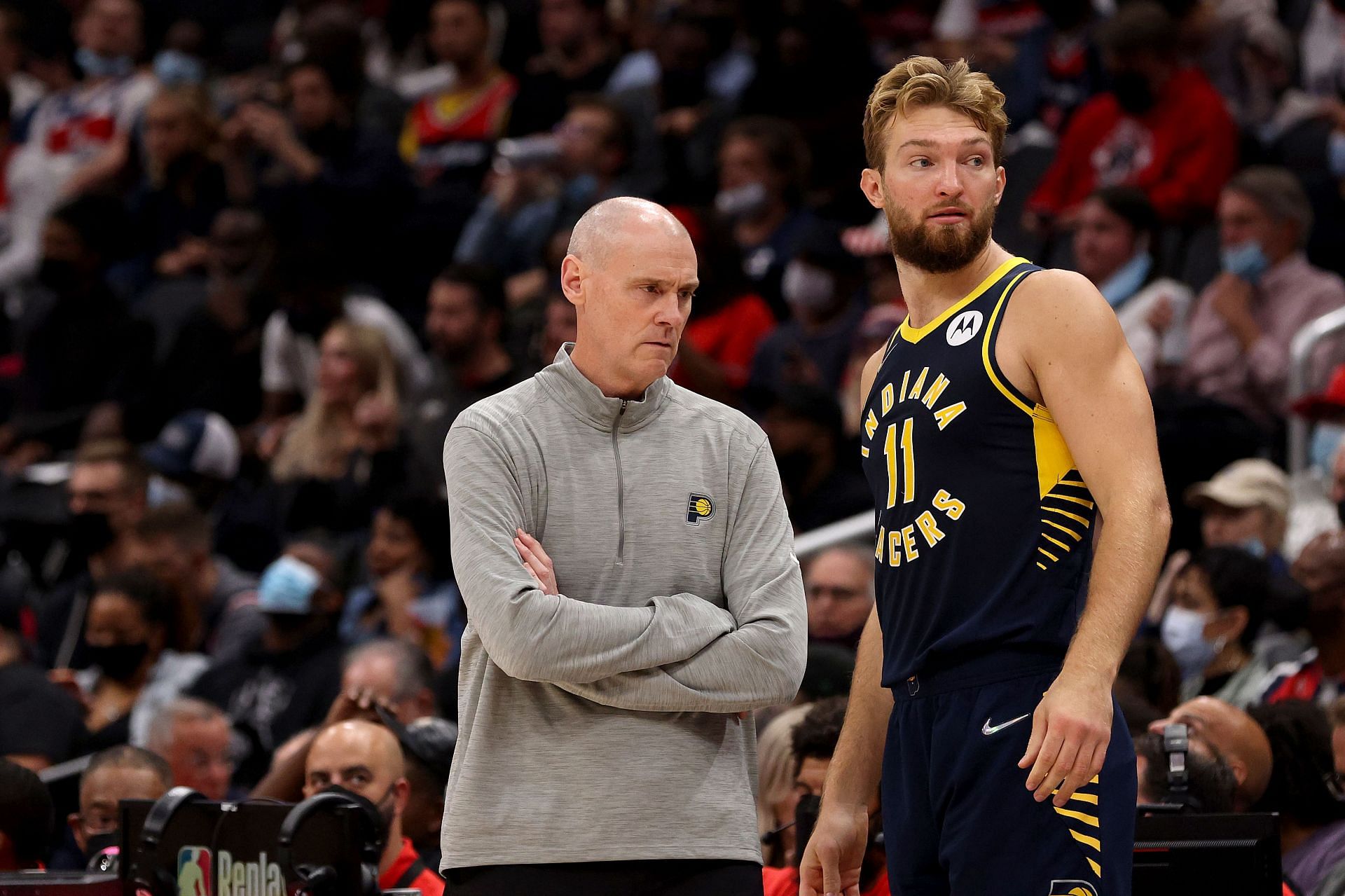 Domantas Sabonis (right) in conversation with Indiana Pacers head coach Rick Carlisle