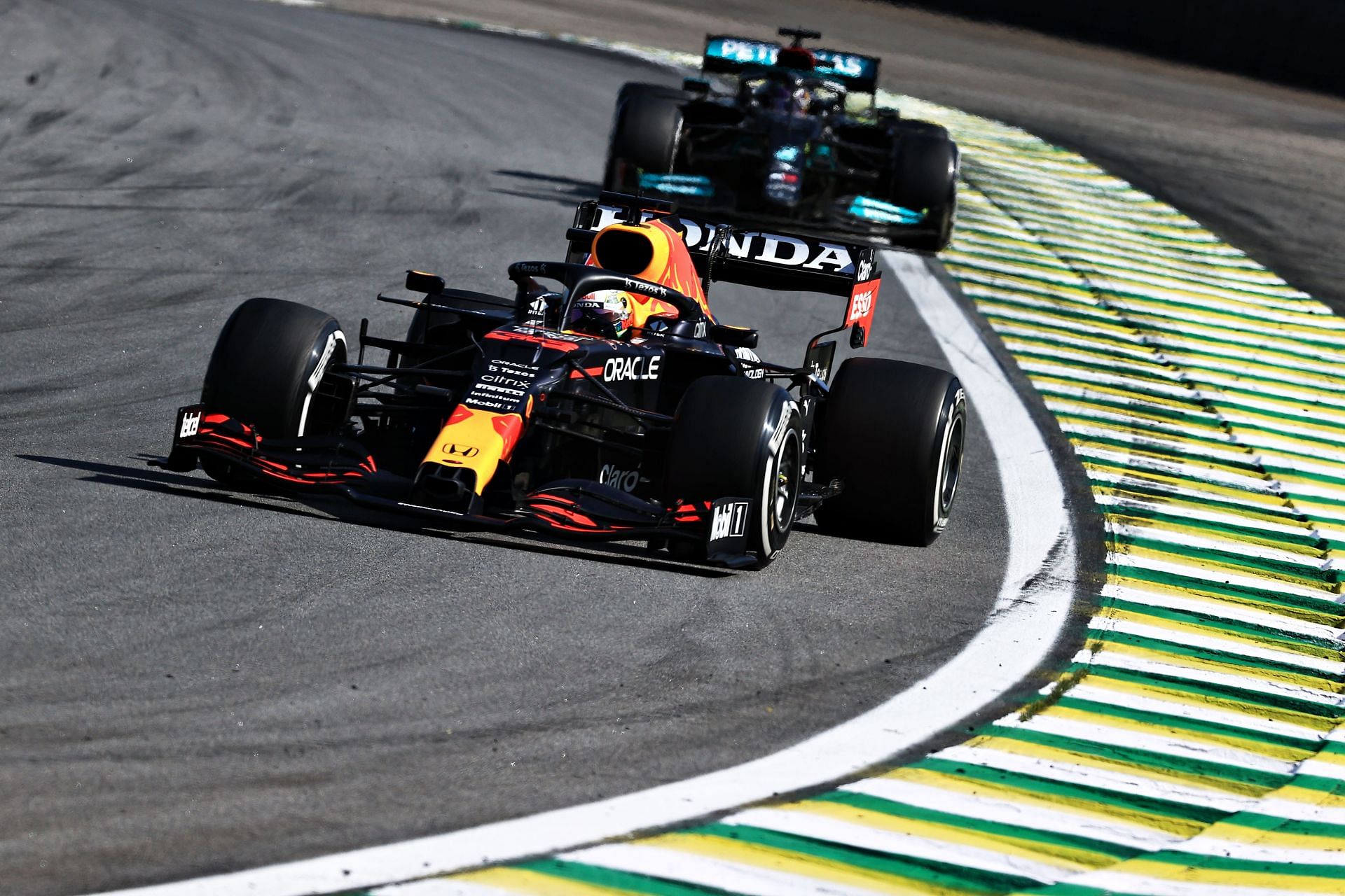 Max Verstappen leads Lewis Hamilton during the F1 Grand Prix of Brazil at Autodromo Jose Carlos Pace in Sao Paulo, Brazil. (Photo by Buda Mendes/Getty Images)