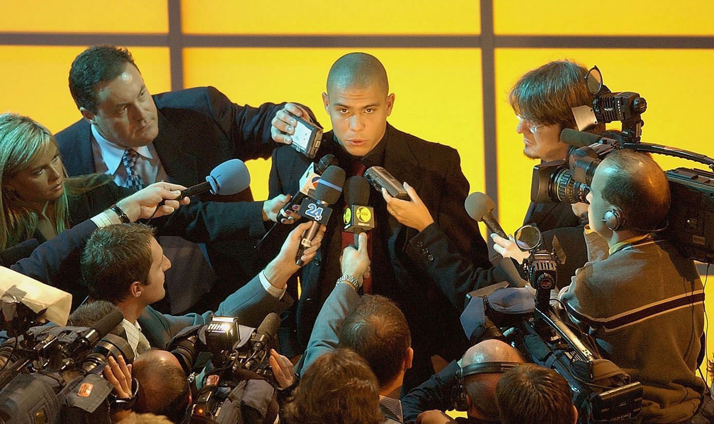 Ronaldo of Brazil is surrounded by the press