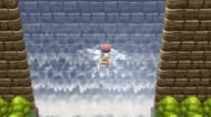 A trainer is climbing a waterfall (Image via ILCA)