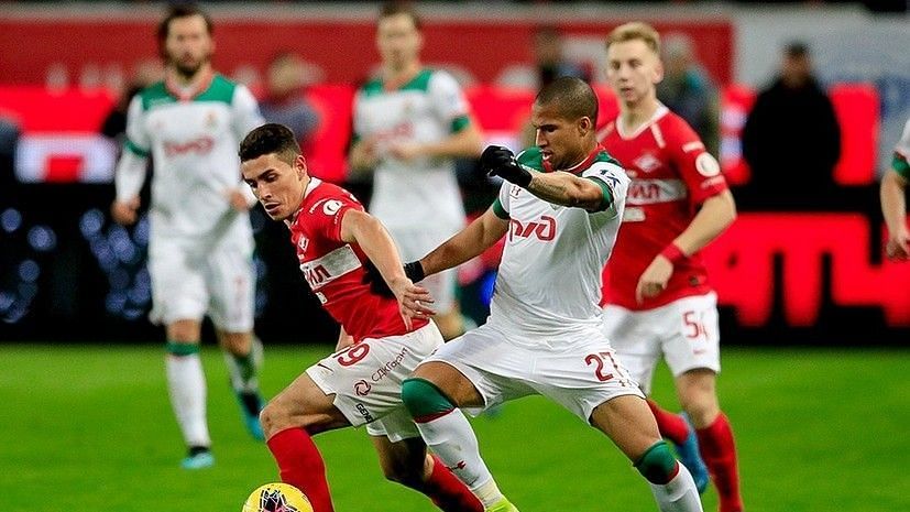 Fonbet - Russian Football Cup 2022/23. Match between the teams Spartak ( Moscow) - Lokomotiv (Moscow) at the stadium Opening Arena. From left to  right: Spartak team players Quincy Promes, Mikhail Ignatov and