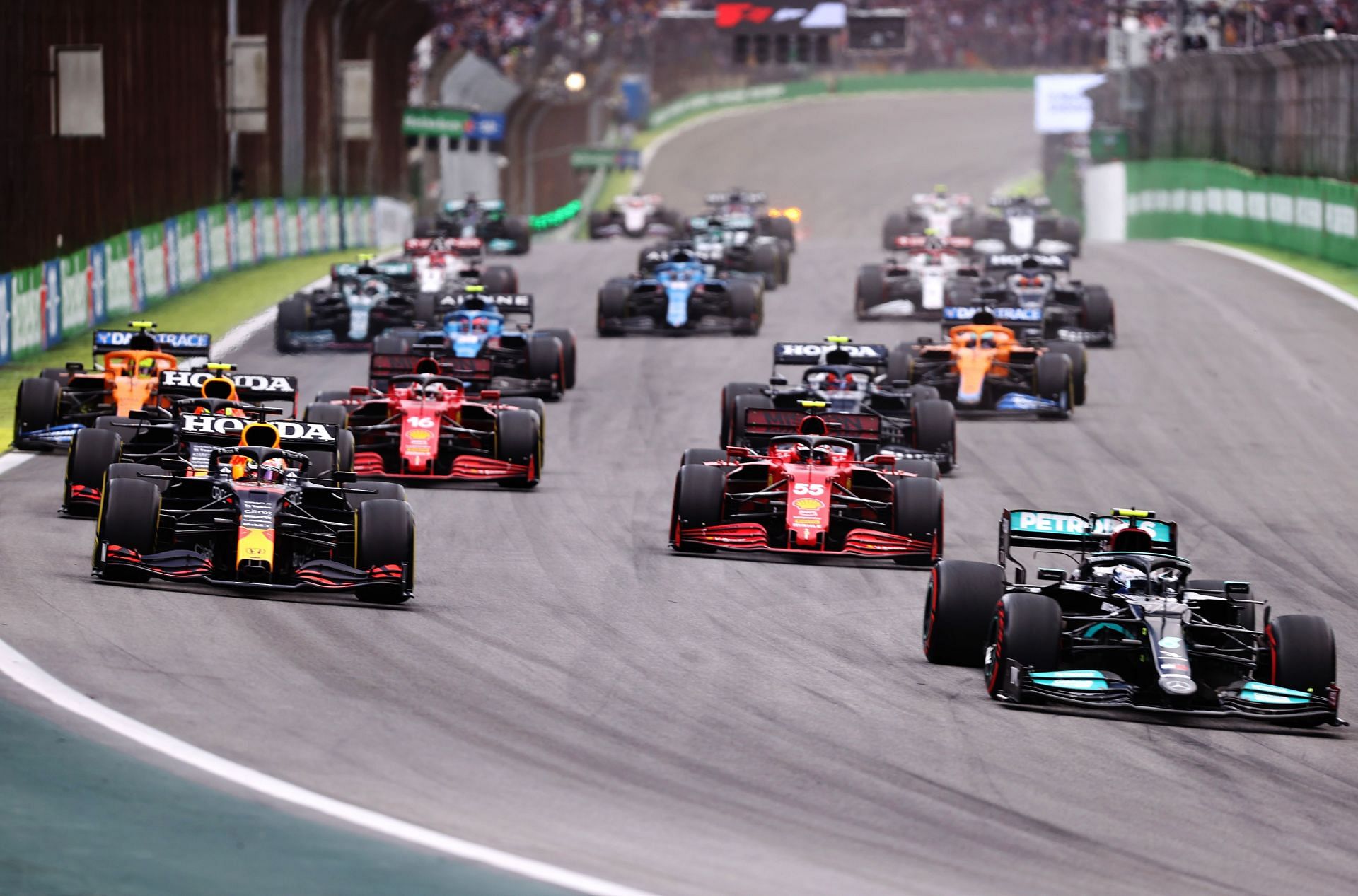 Valtteri Bottas of Finland leads Max Verstappen and the rest of the field into turn one at the start of the 2021 Brazil Grand Prix sprint race. (Photo by Lars Baron/Getty Images)