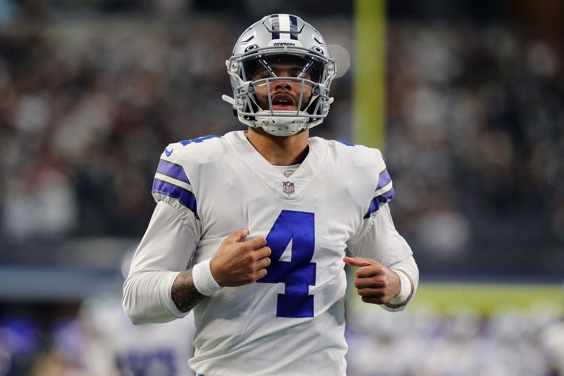 Dallas Cowboys quarterback Dak Prescott (4) looks to pass during a  Thanksgiving day NFL football game against the Las Vegas Raiders, Thursday,  Nov. 25, 2021, in Arlington, Texas. (AP Photo/Matt Patterson Stock