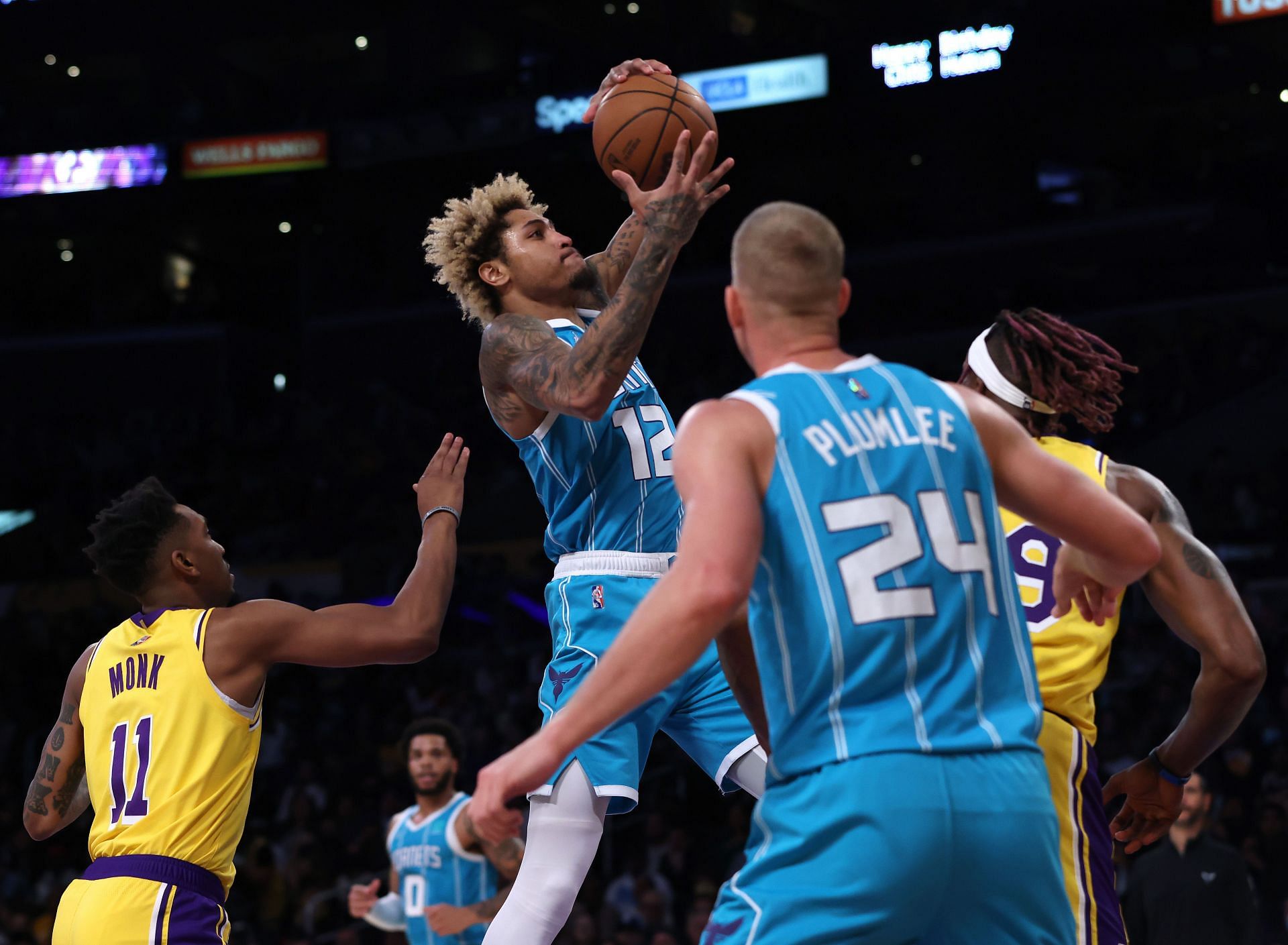 Kelly Oubre Jr. and Mason Plumlee of the Charlotte Hornets at Staples Center