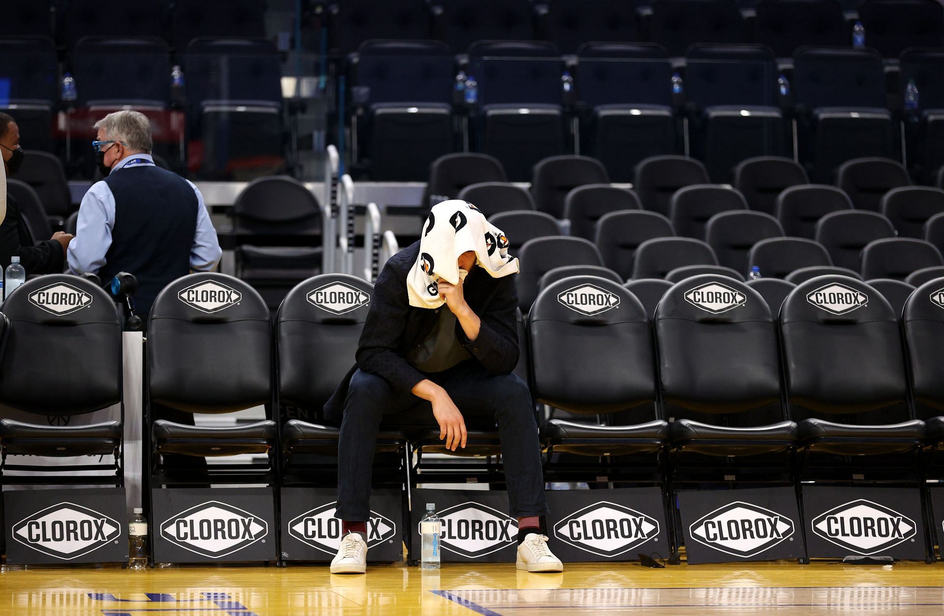 Klay Thompson sits alone on the bench after the Warriors win over the Trail Blazers on Friday.