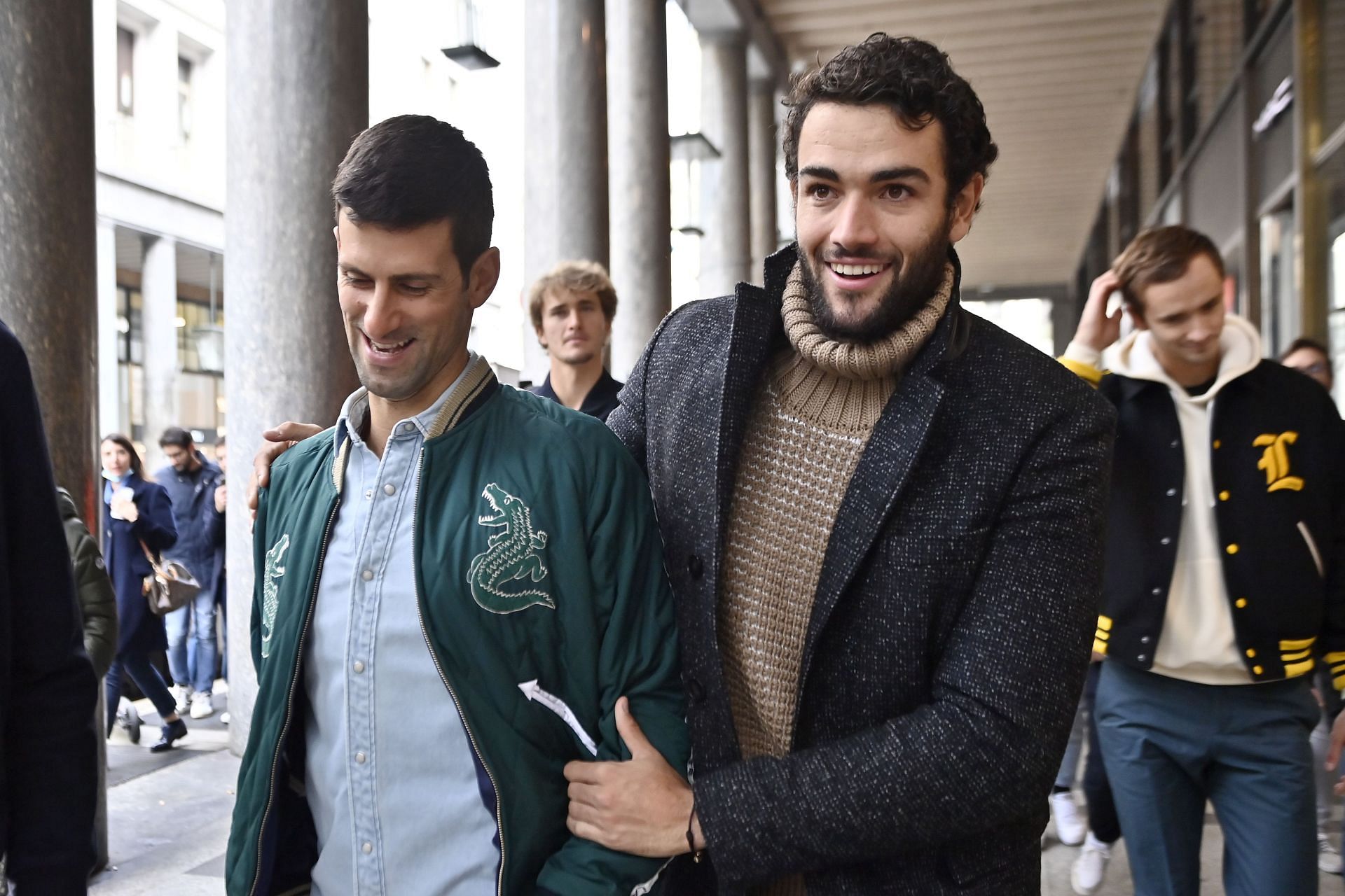 Matteo Berrettini shares a light moment with Novak Djokovic in Turin