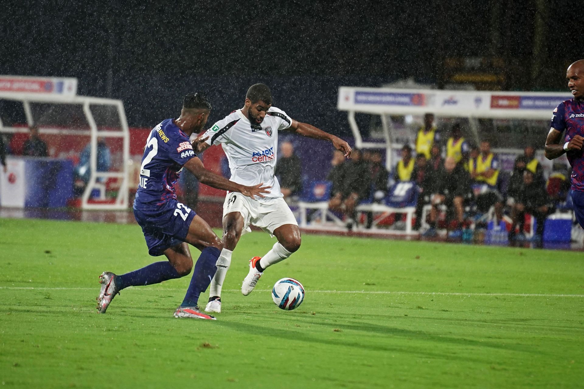 Bengaluru FC player trying to win the ball from NorthEast United FC player during an ISL game - Image: NEUFC Twitter