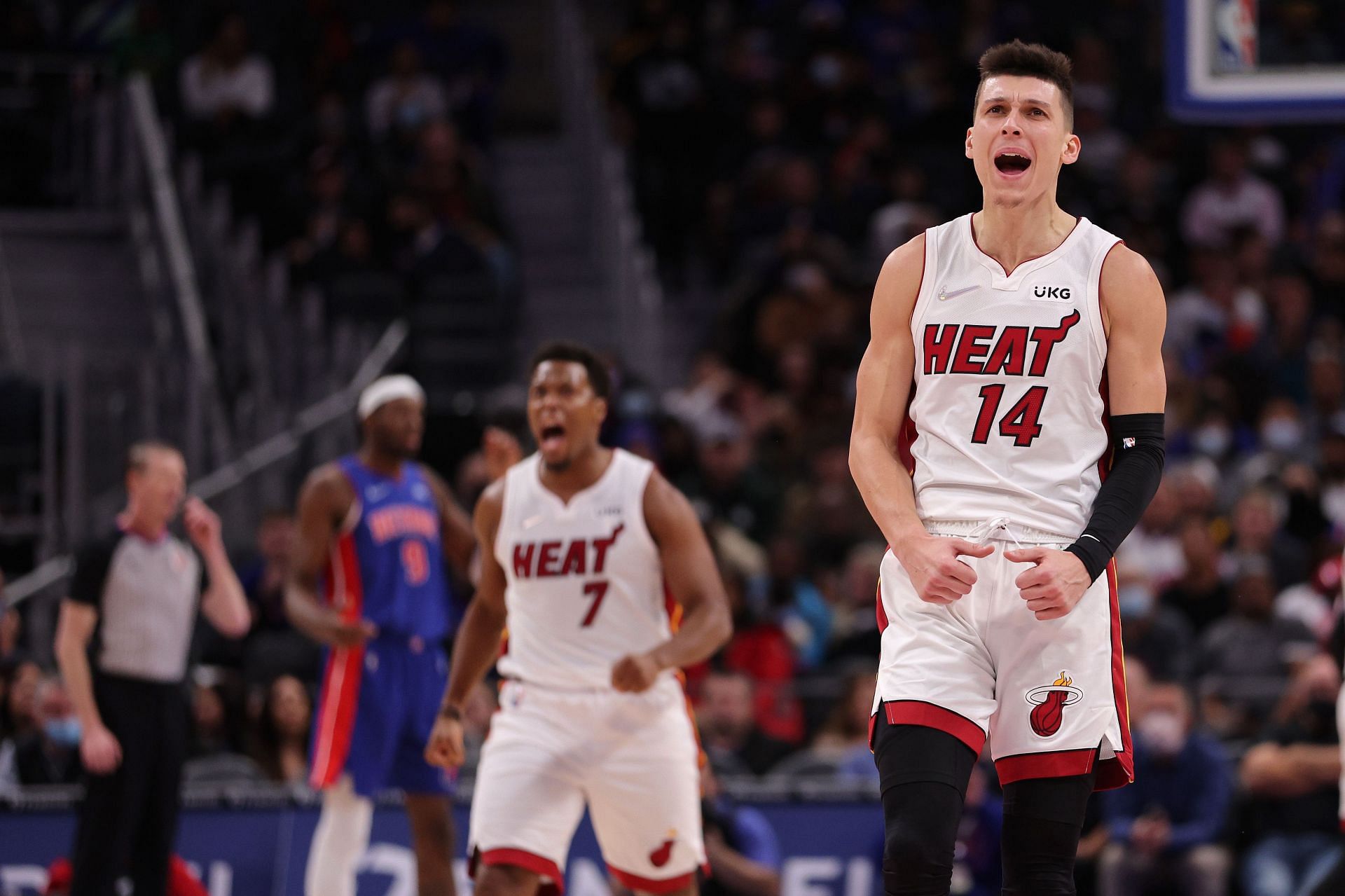 Miami Heat players react during their victory over the Detroit Pistons.