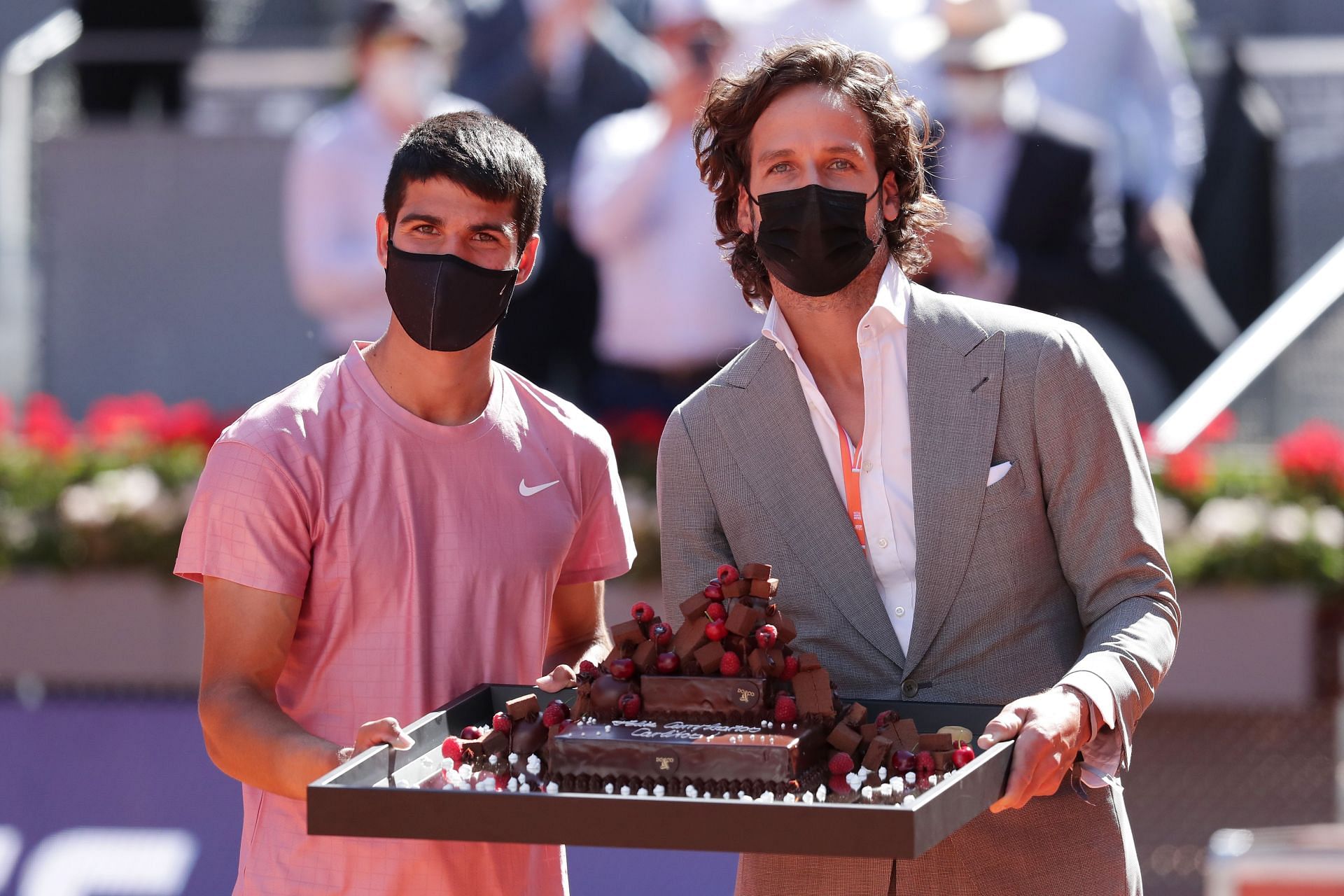 Carlos Alcaraz and Feliciano Lopez at the 2021 Mutua Madrid Open.