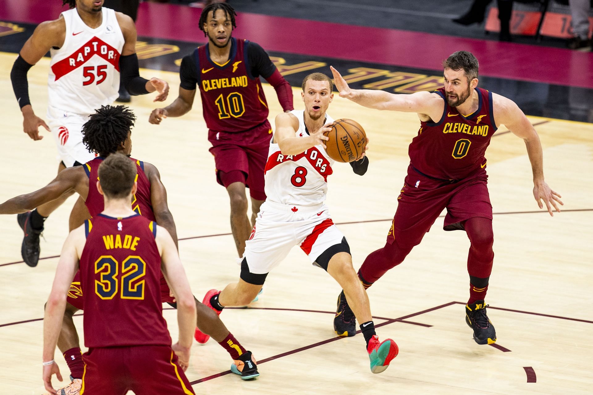 Malachi Flynn of the Toronto Raptors drives against the Cleveland Cavaliers.