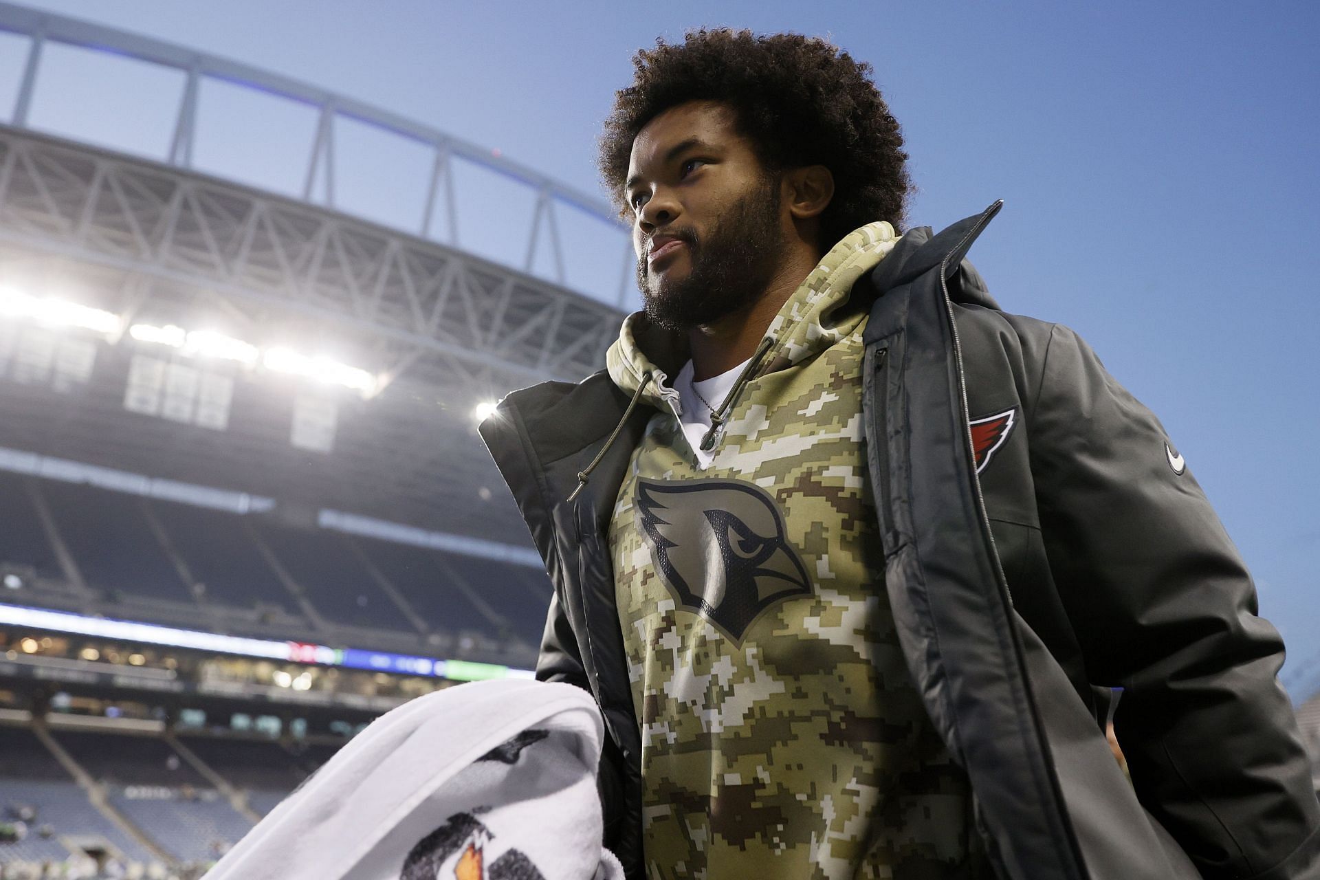Relegated to street clothes, Murray leaves the field after his Arizona teammates earned a 23-13 win over Seattle last weekend (Photo: Getty)