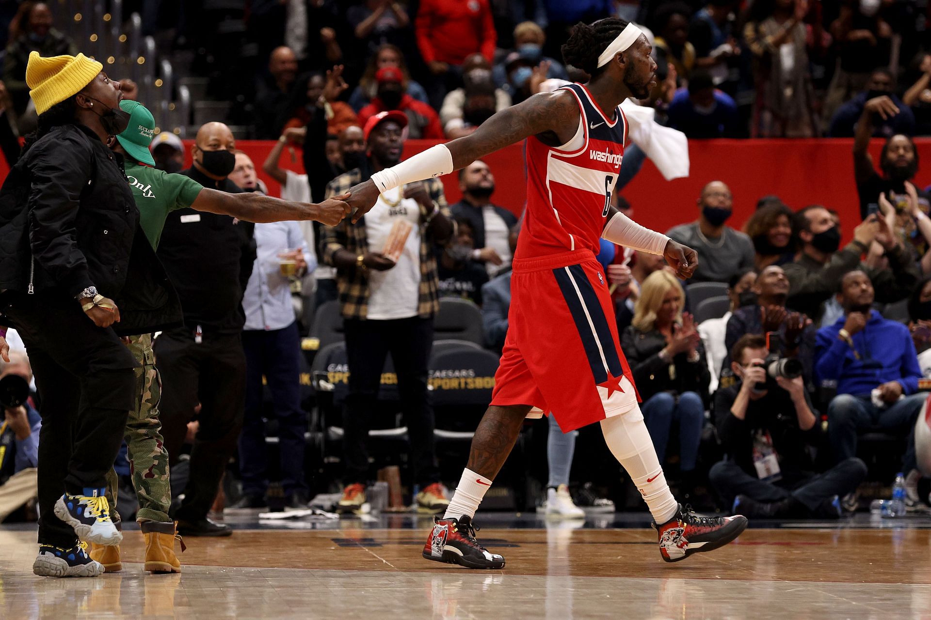 Montrezl Harrell #6 of the Washington Wizards celebrates with fans