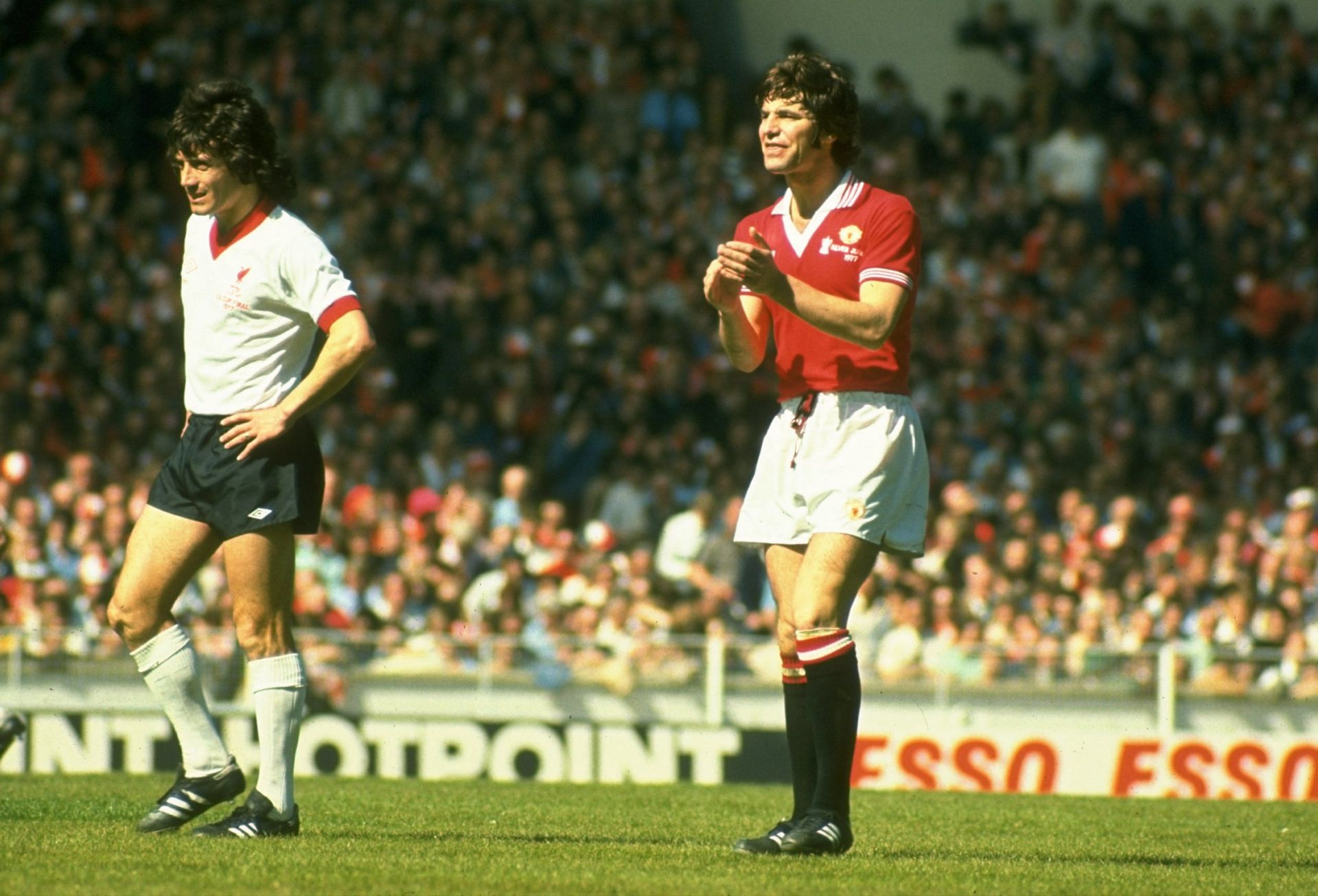 Martin Buchan of Manchester United and Kevin Keegan of Liverpool