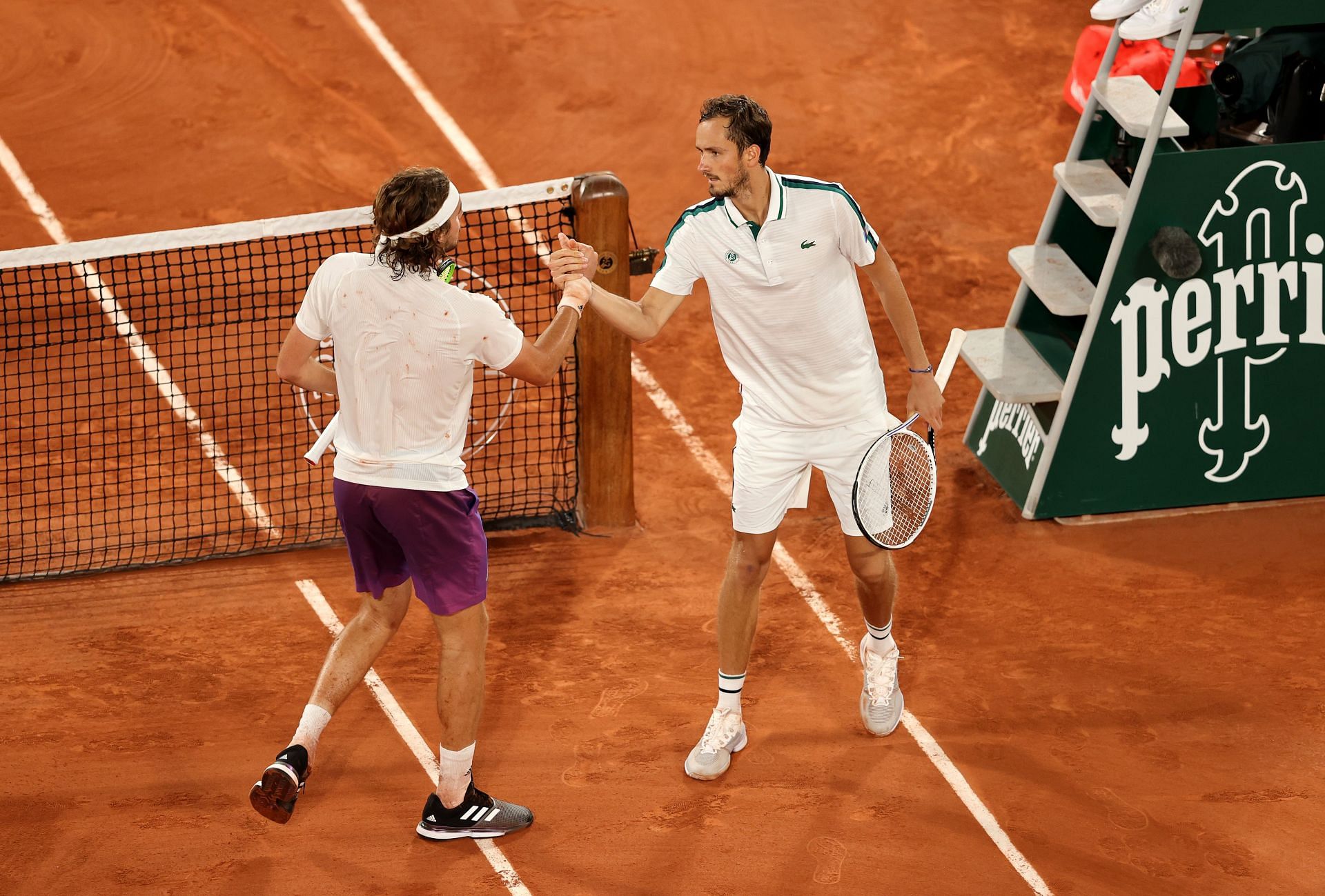 Stefanos Tsitsipas and Daniil Medvedev at the 2021 French Open - Day Ten