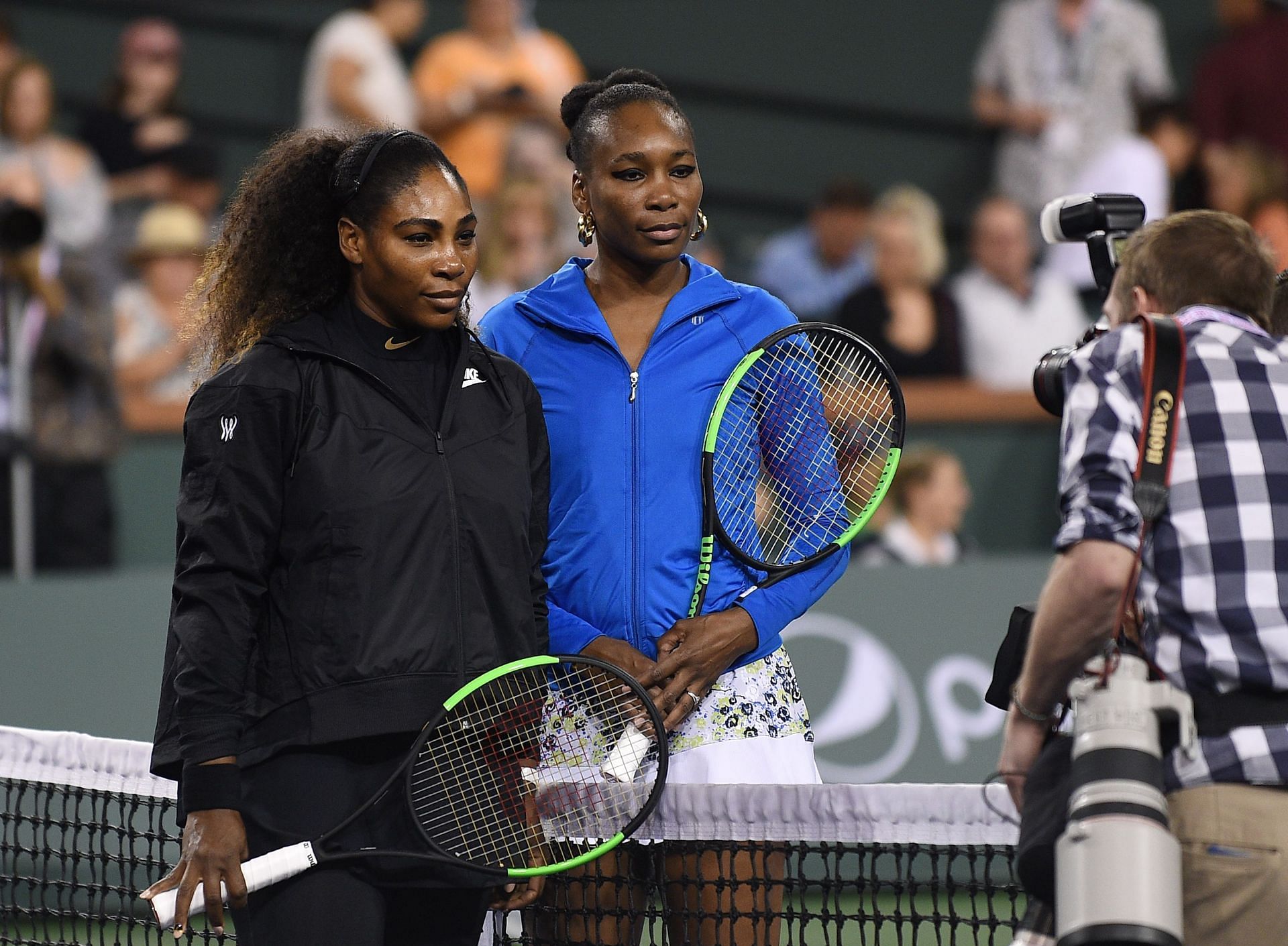 Serena (L) and Venus Williams at the BNP Paribas Open.