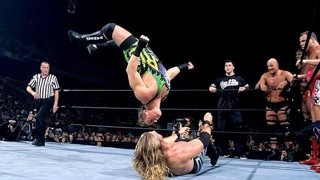 Rob Van Dam hitting a moonsault on Chris Jericho