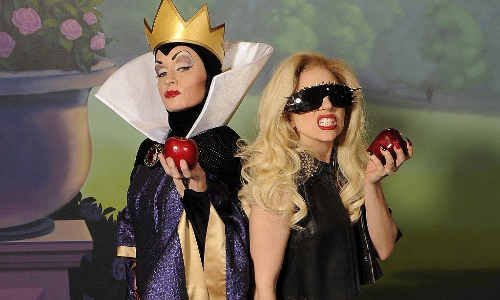 Lady Gaga posing beside a model dressed as the Evil Queen in Snow White(picture via Dailymail)