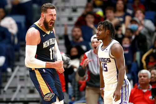 Jonas Valanciunas of the New Orleans Pelicans celebrates in front of Sacramento Kings' Davion Mitchell.