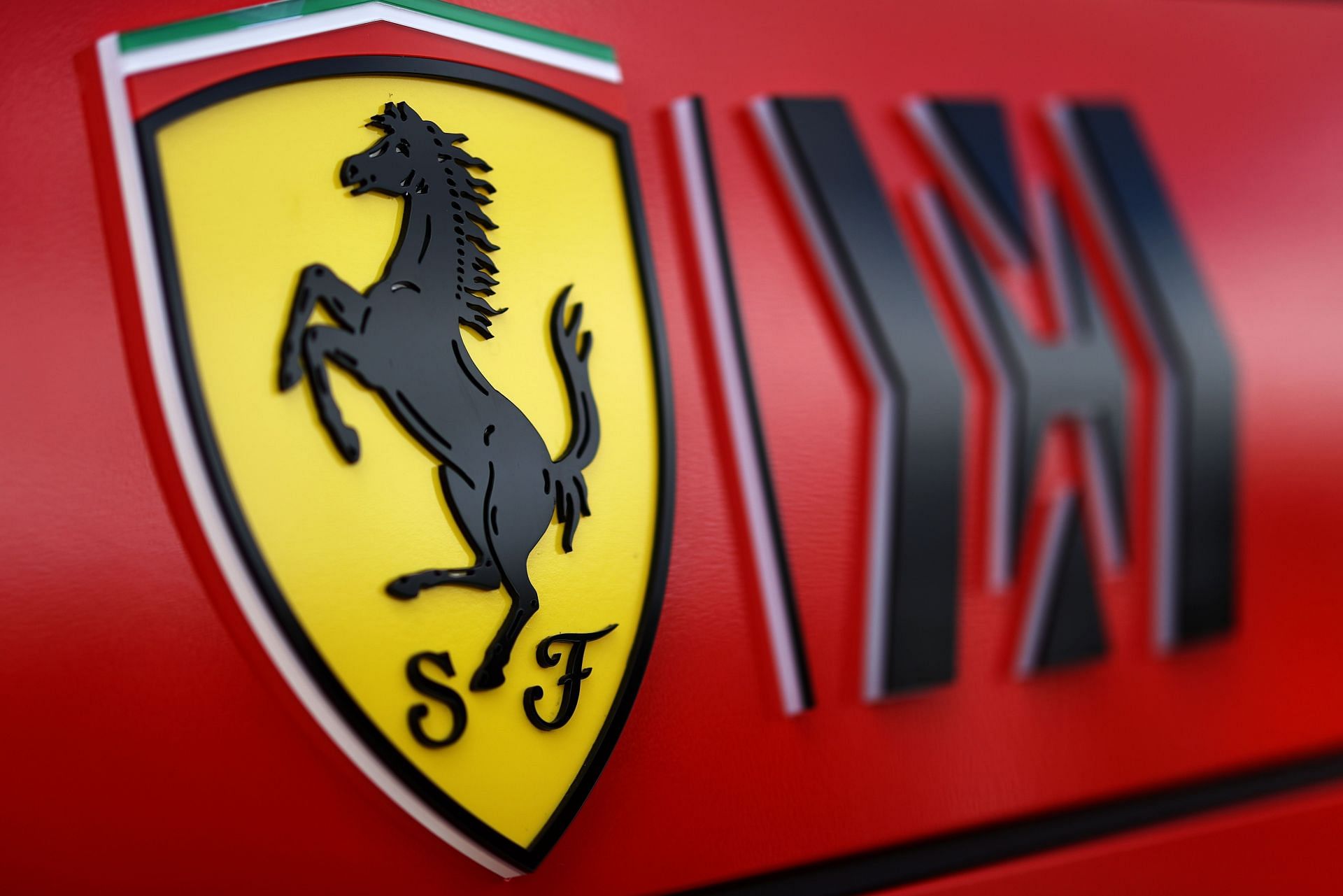 The Ferrari logo in the Paddock next to Phillip Morris&#039; Mission Winnow logo. (Photo by Chris Graythen/Getty Images)