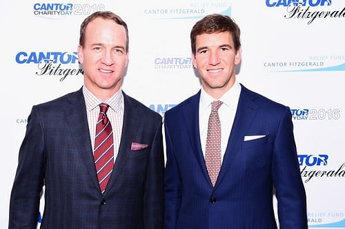 Peyton and Eli Manning (photo via masslive.com)