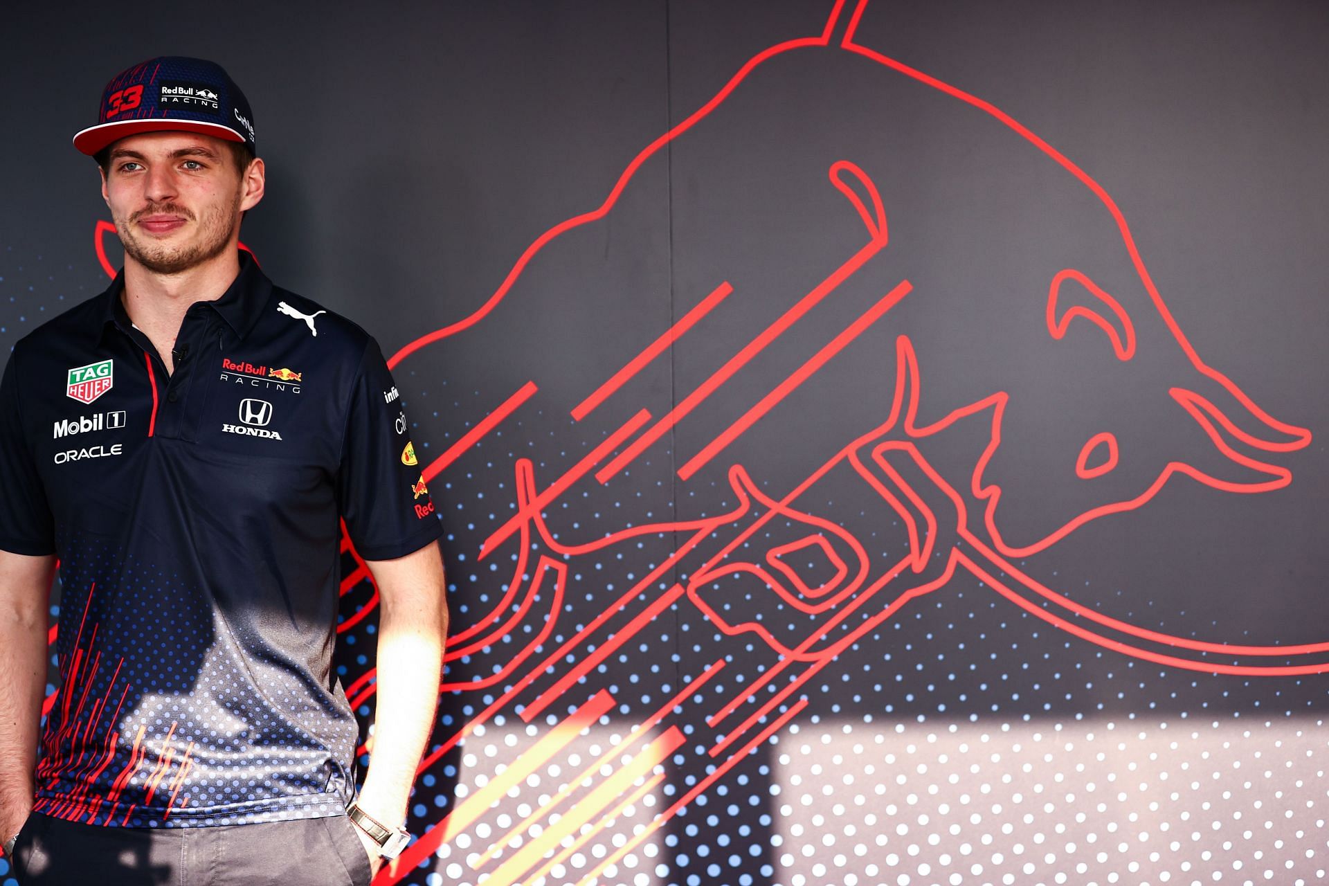 Max Verstappen looks on in the paddock ahead of the 2021 Qatar Grand Prix. (Photo by Mark Thompson/Getty Images)