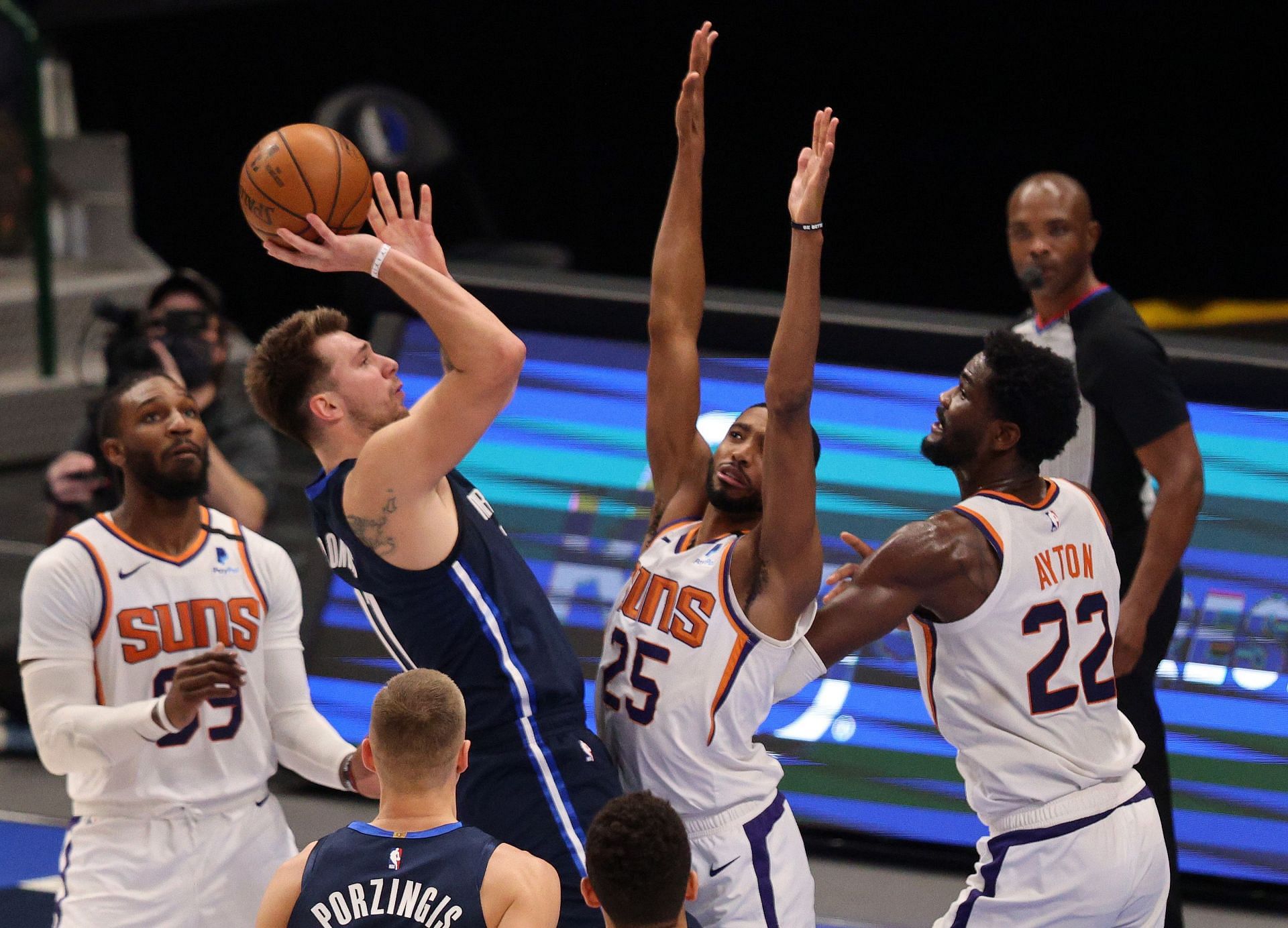 Luka Doncic of the Dallas Mavericks shoots over the Phoenix Suns.