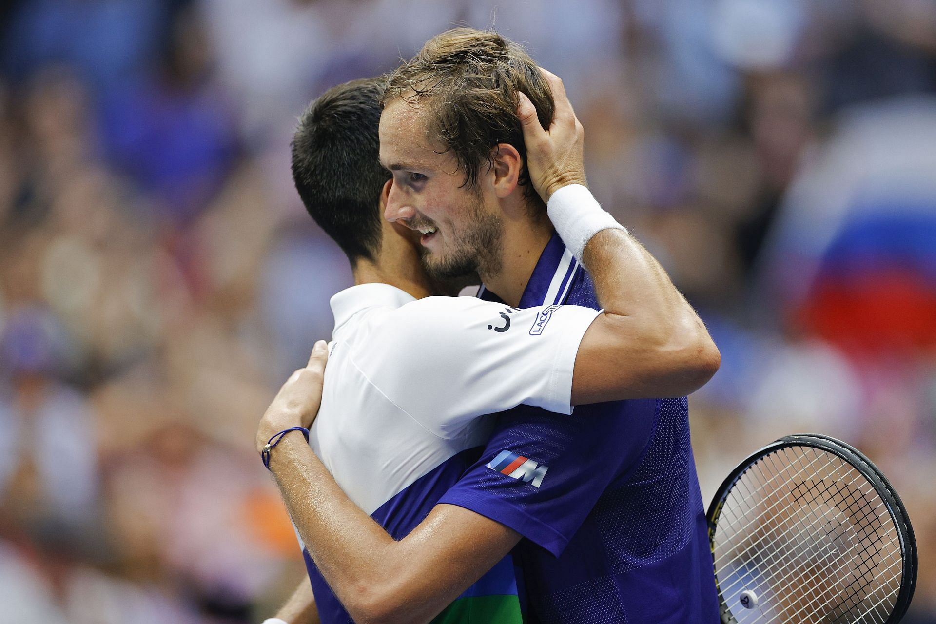 Novak Djokovic hugs Daniil Medvedev after losing the 2021 US Open final