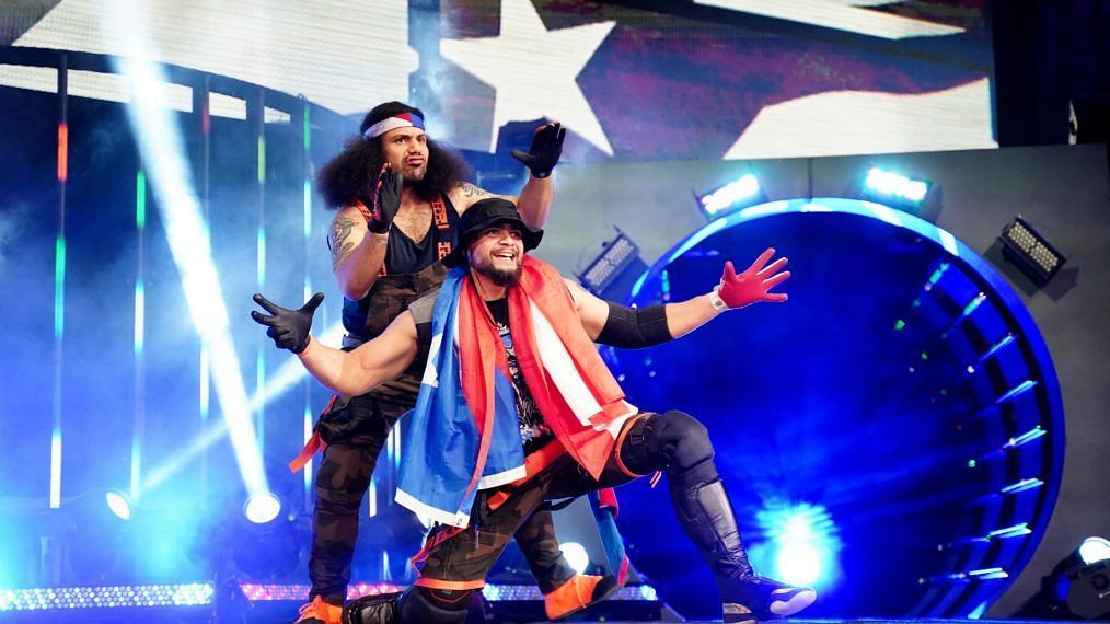 Santana and Ortiz making their entrance at an AEW show.