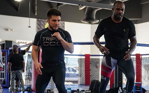 Henry Cejudo (left) & Jon Jones (right) [Image Credits- @JonnyBones on Twitter]