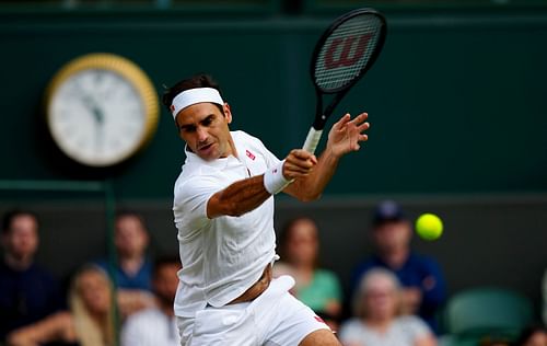 Roger Federer in action at Wimbledon 2021