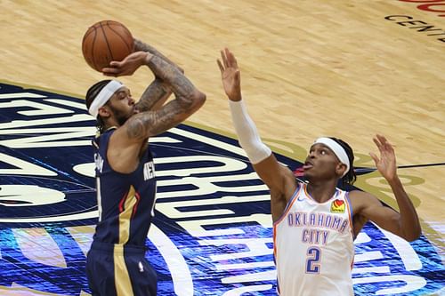 Brandon Ingram of the New Orleans Pelicans shoots over Shai Gilgeous-Alexander of the OKC Thunder.