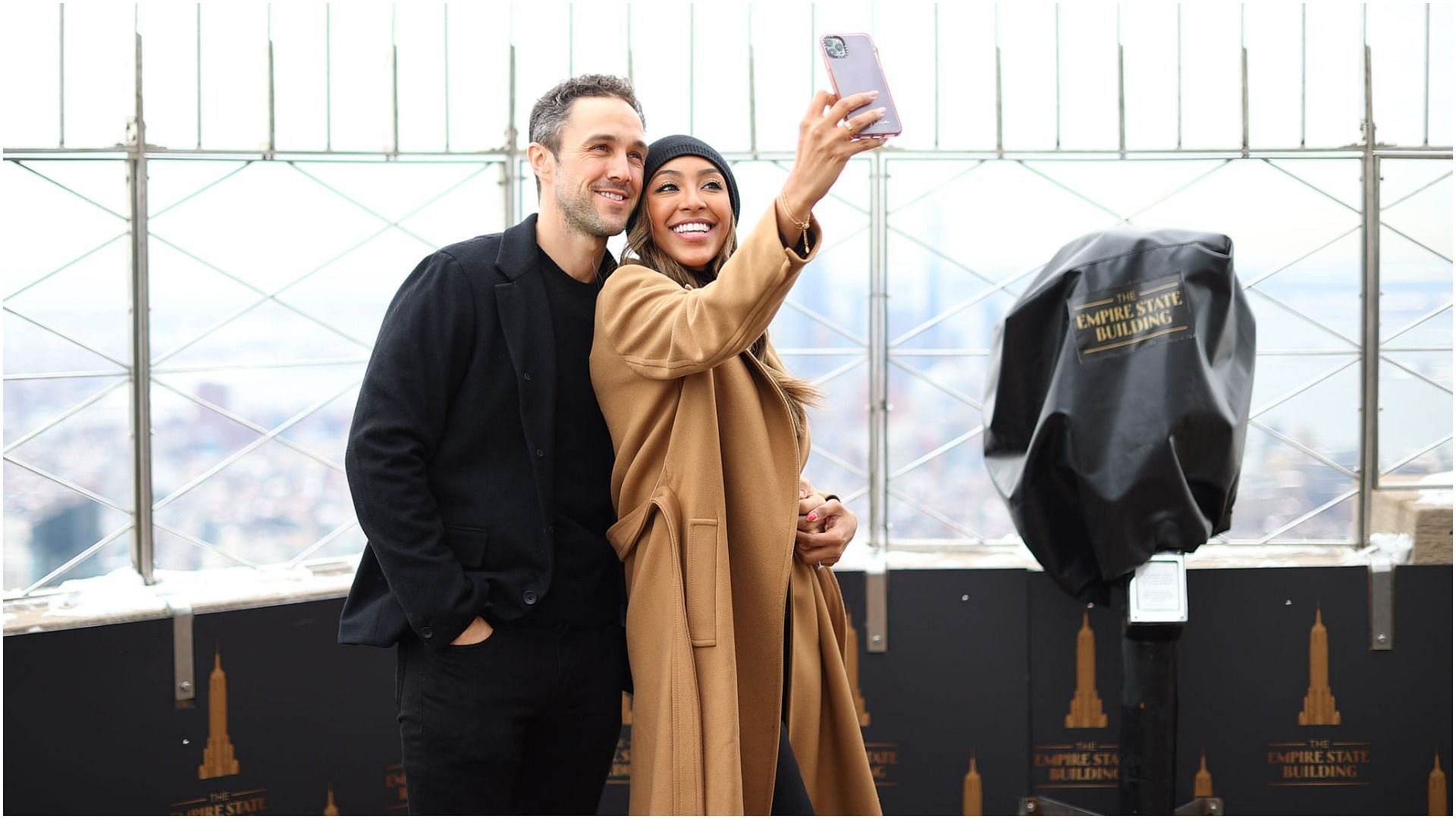 Tayshia Adams and Zac Clark celebrate their love at The Empire State Building (Image via Getty Images/Dimitrios Kambouris)