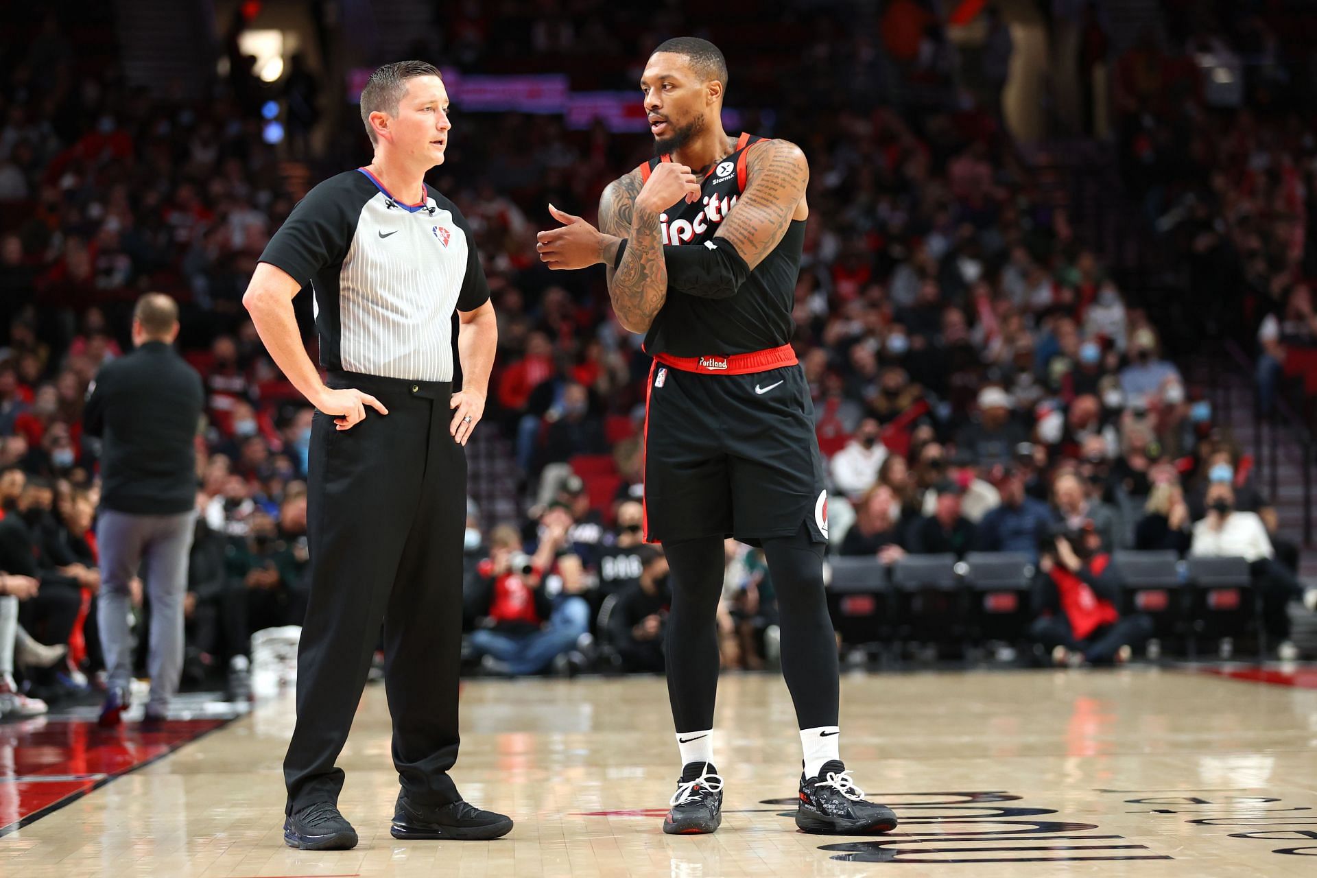 Portland Trail Blazers All-Star Damian Lillard talks to a referee