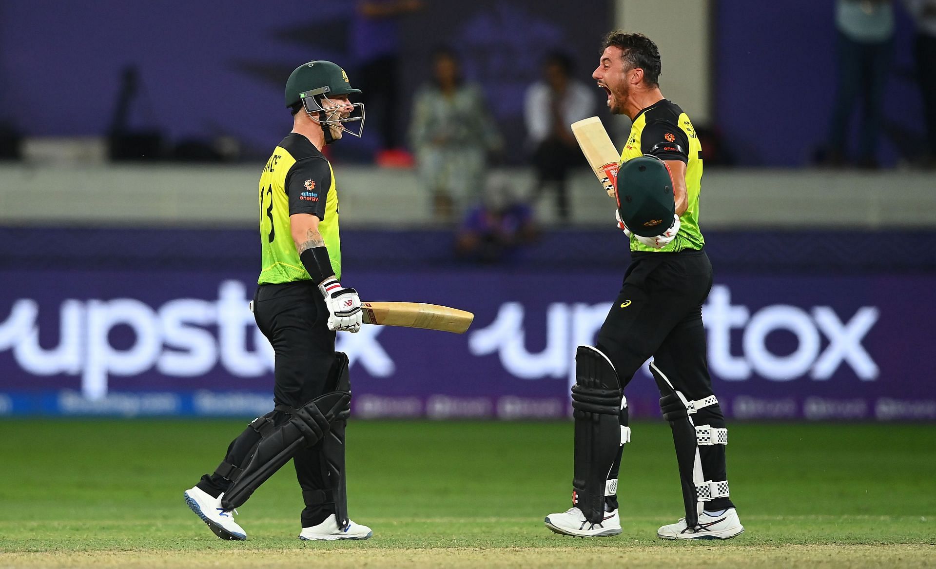 Matthew Wade (left) and Marcus Stoinis celebrate after Australia&rsquo;s win over Pakistan in the semi-final. Pic: Getty Images