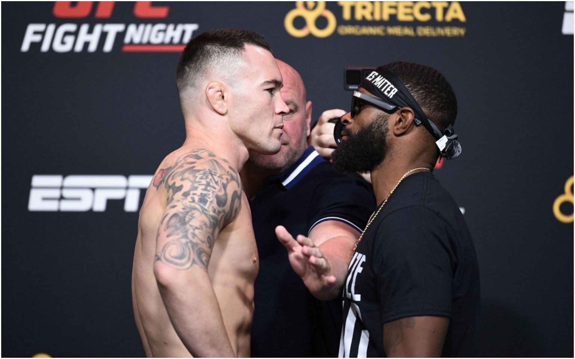 Colby Covington and Tyron Woodley face off