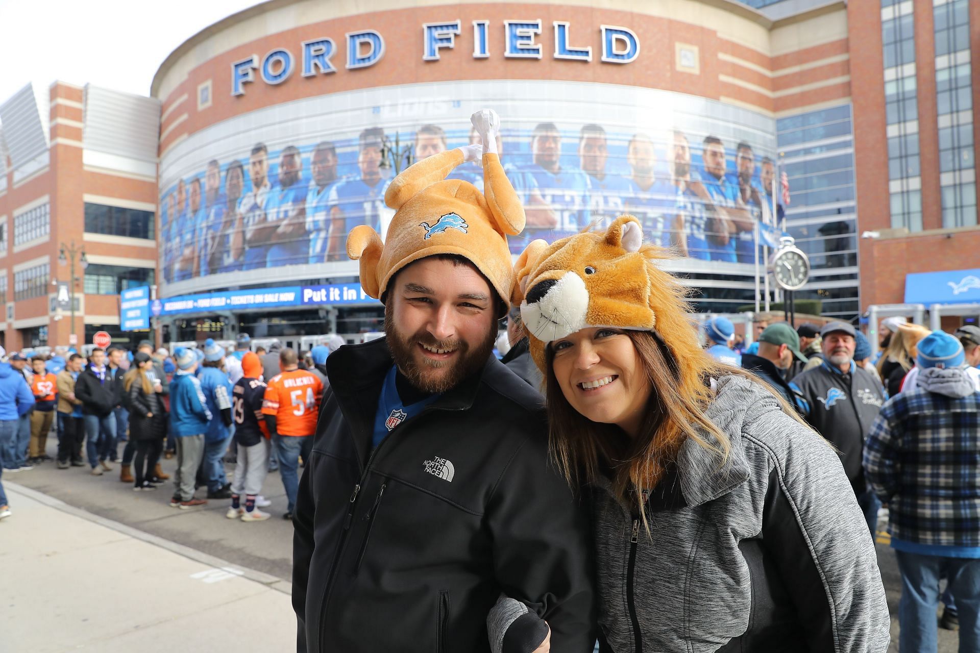 Lions fans pose in front of Ford Field prior to their 2019 Thanksgiving contest  (Photo:Getty)