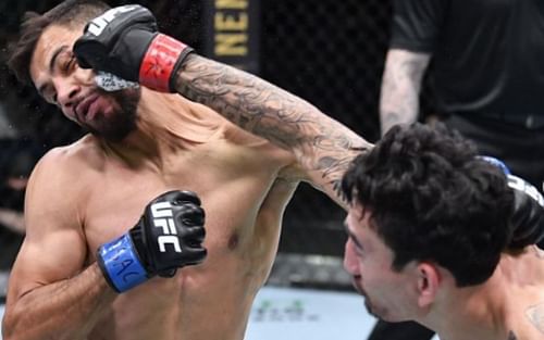 UFC featherweight contenders Yair Rodriguez (left) and Max Holloway (right) in action at the UFC Apex [Image Credit: @ufc on Instagram]