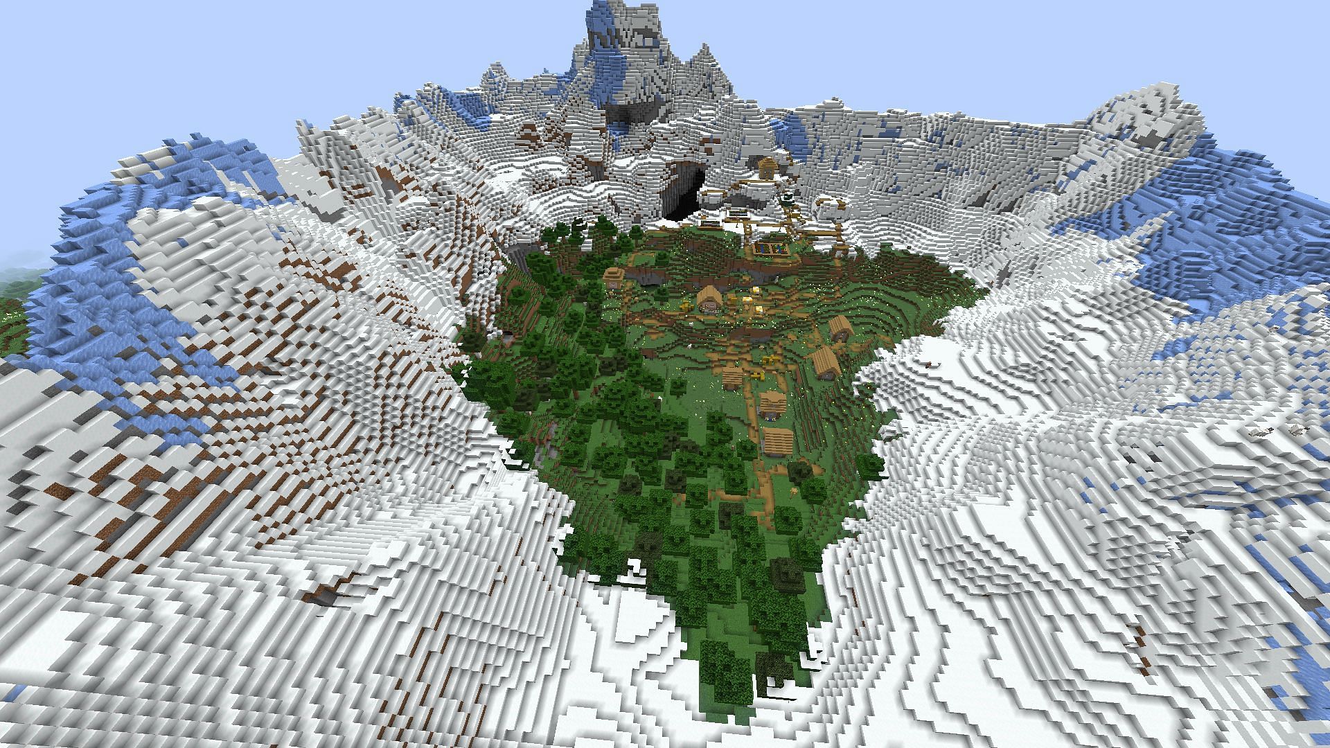 A village surrounded by mountains (Image via Minecraft)