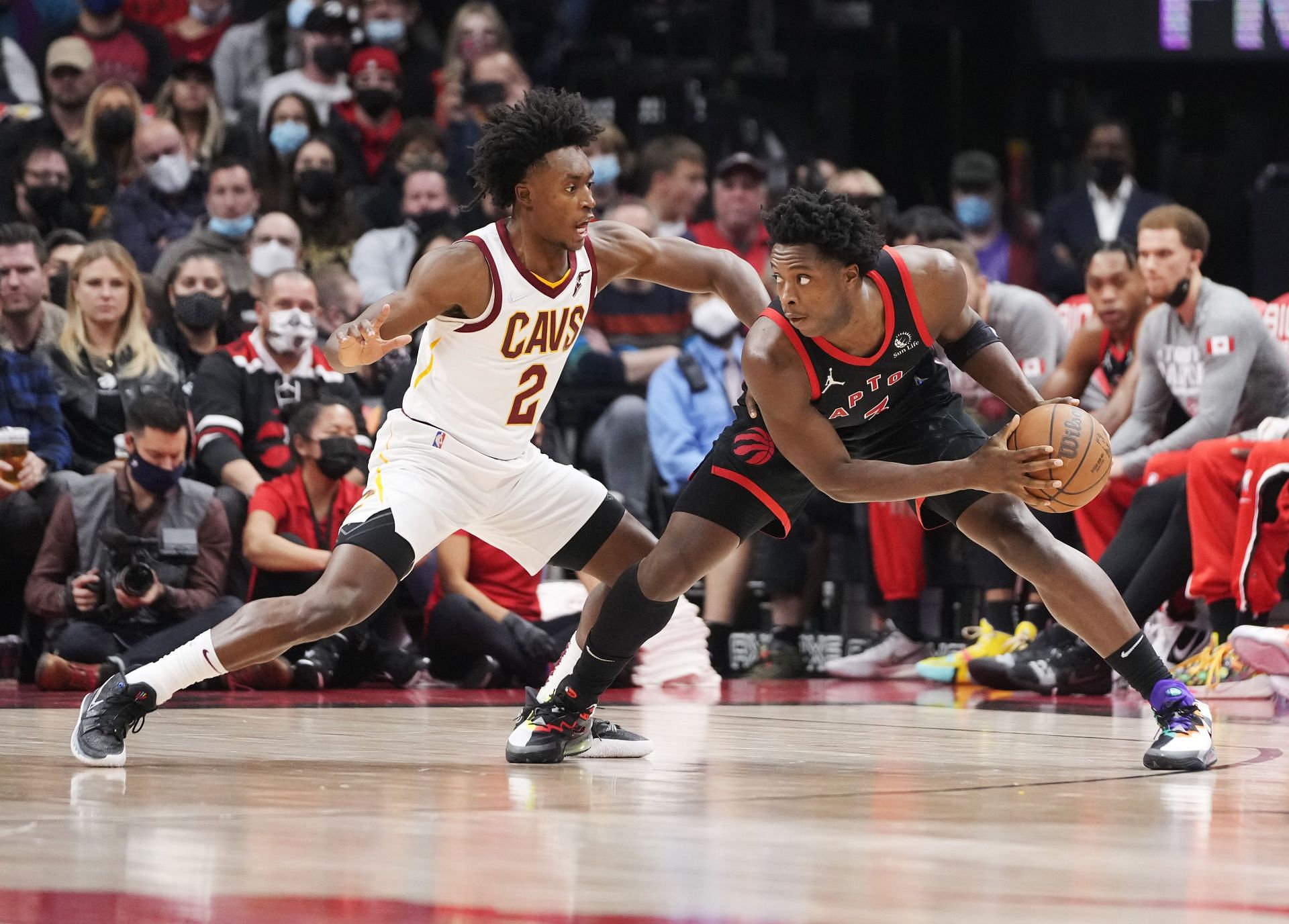 OG Anunoby #3 of the Toronto Raptors is guarded by Collin Sexton #2 of the Cleveland Cavaliers during the first half of their basketball game at the Scotiabank Arena on November 5, 2021 in Toronto, Ontario, Canada.