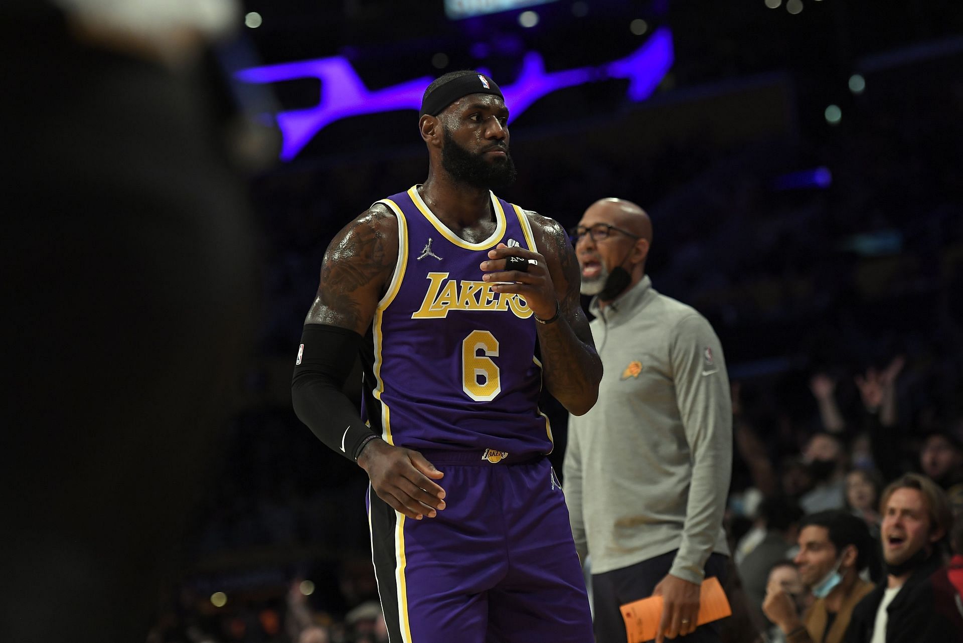 LeBron James looks at the Phoenix Suns bench after scoring at Staples Center on October 22, 2021