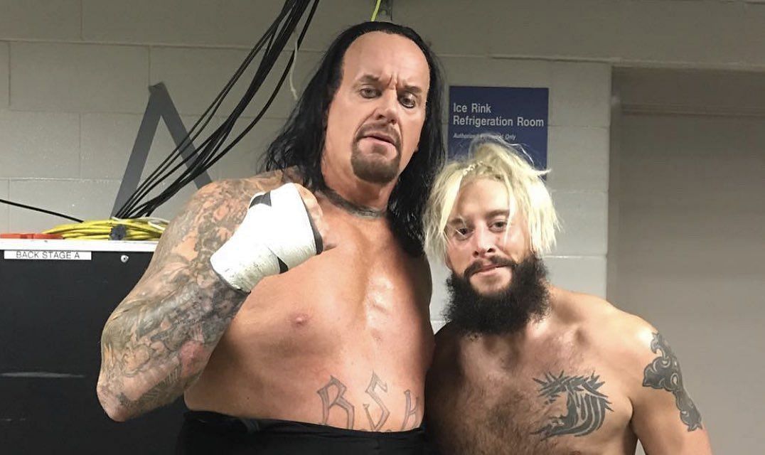 The Undertaker and Enzo Amore in a backstage area