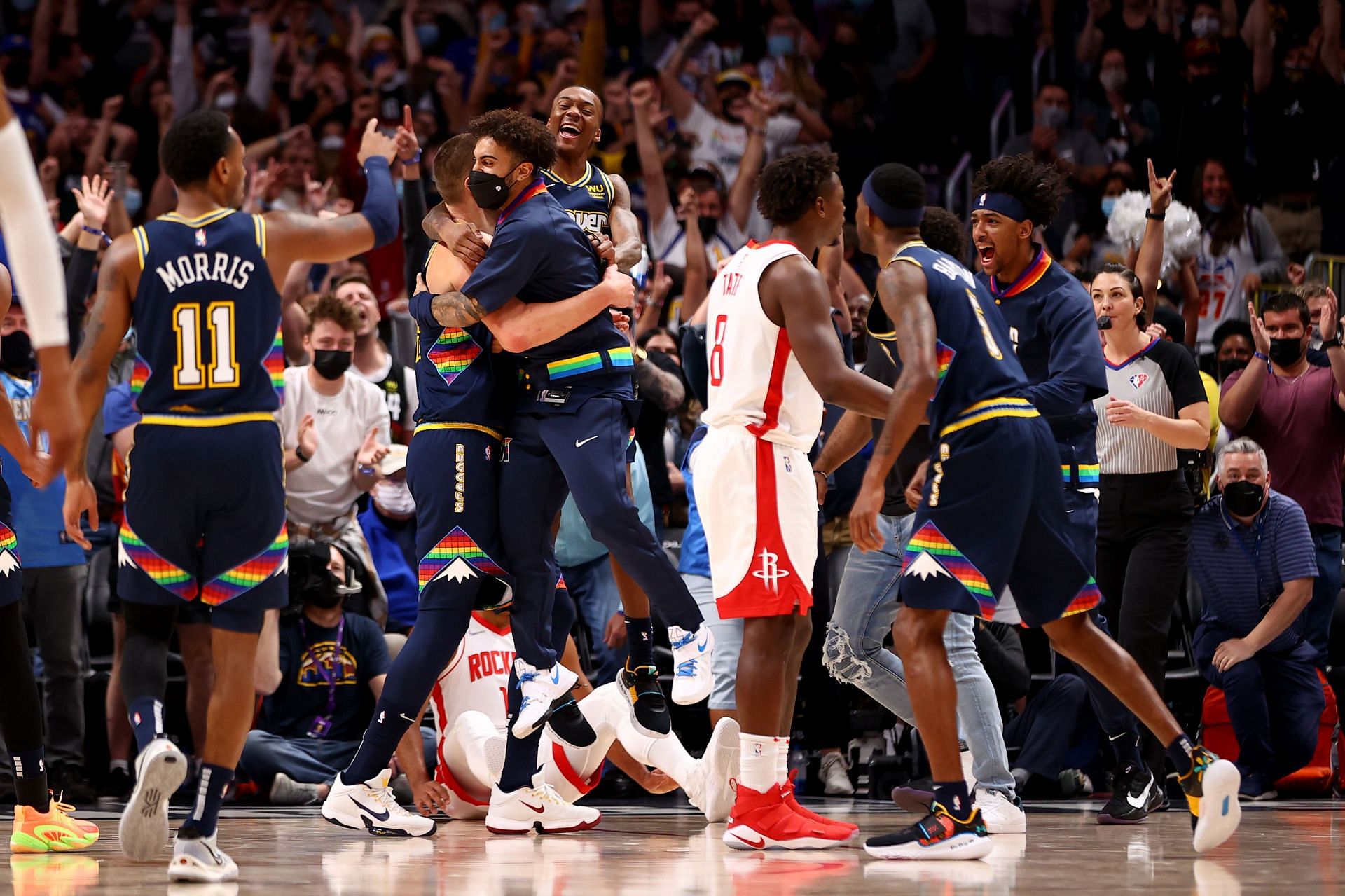 Denver Nuggets celebrate their win against the Rockets.