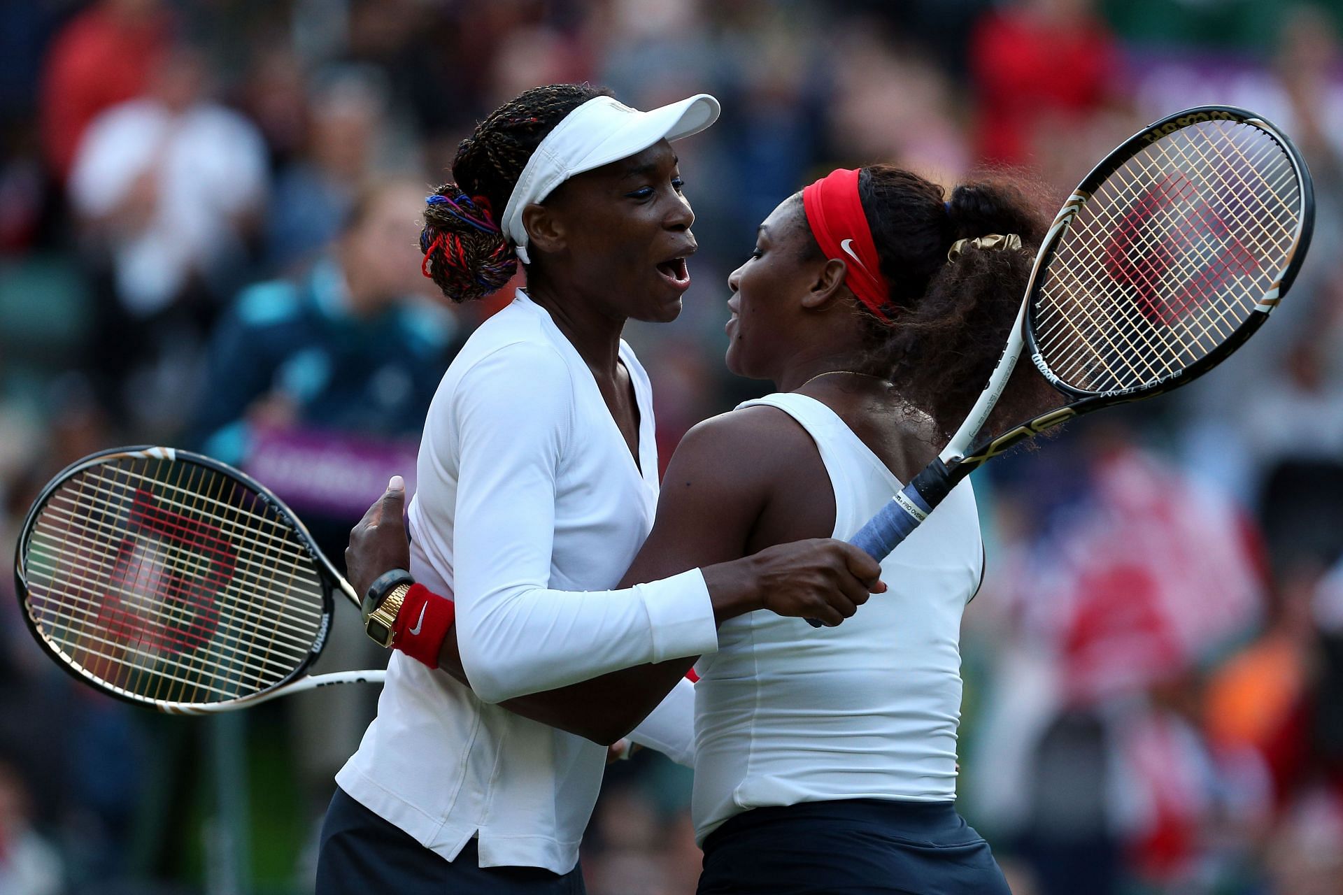 Venus (R) and Serena Williams at the 2012 Olympics.