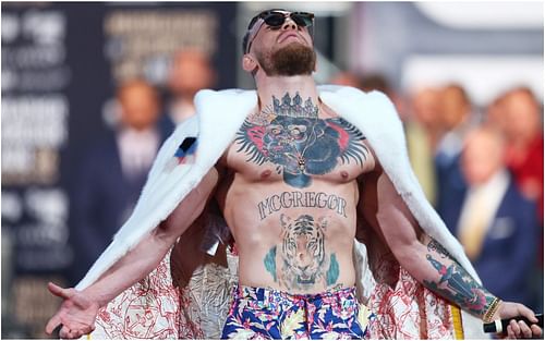 Conor McGregor dressed to the nines for the Mayweather world tour