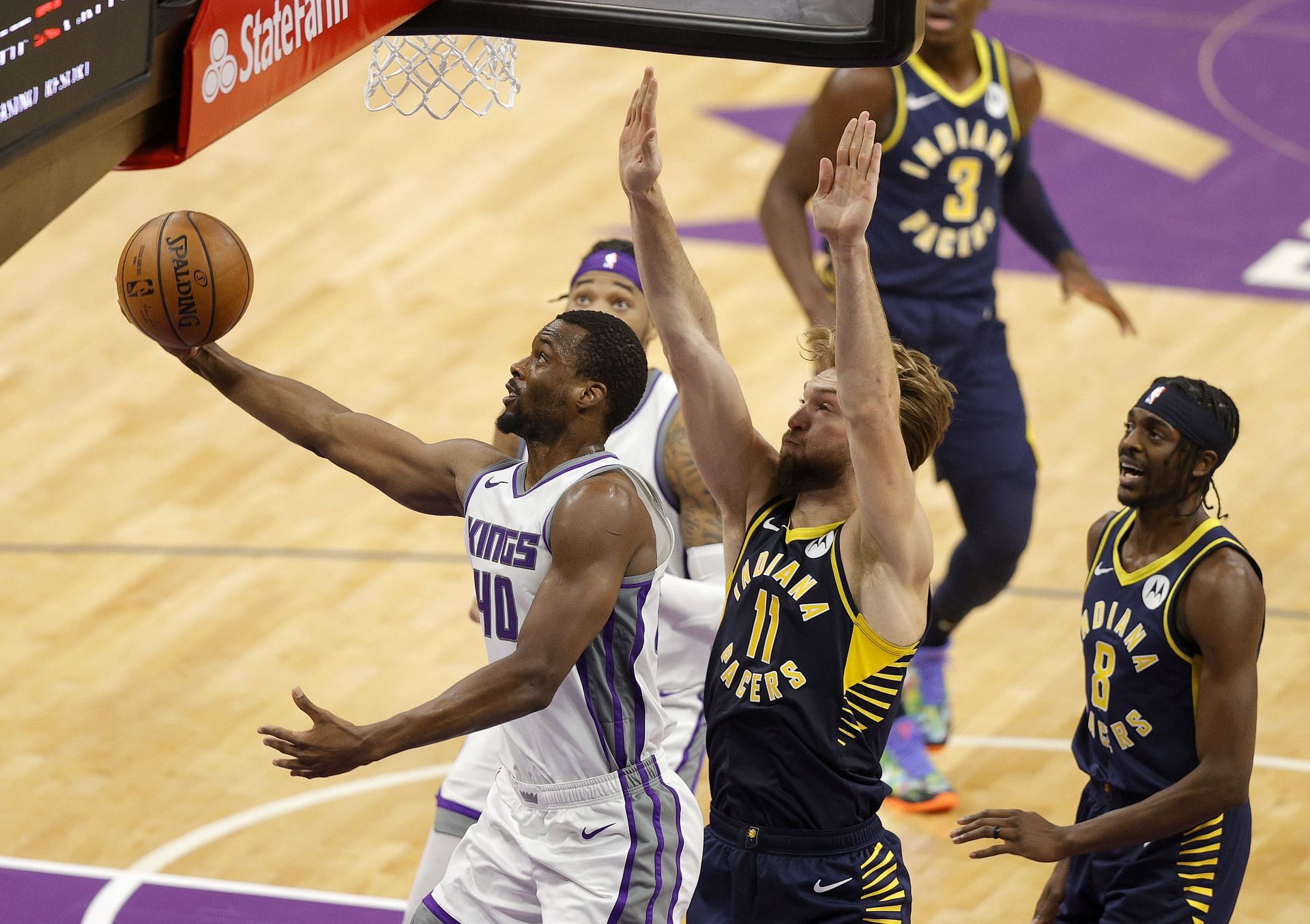 Harrison Barnes of the Sacramento Kings drives by the Indiana Pacers.