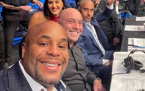 Daniel Cormier (front), Joe Rogan (center), Megan Olivi (left of center), and Jon Anik (back) [Image Courtesy: @dc_mma on Instagram]