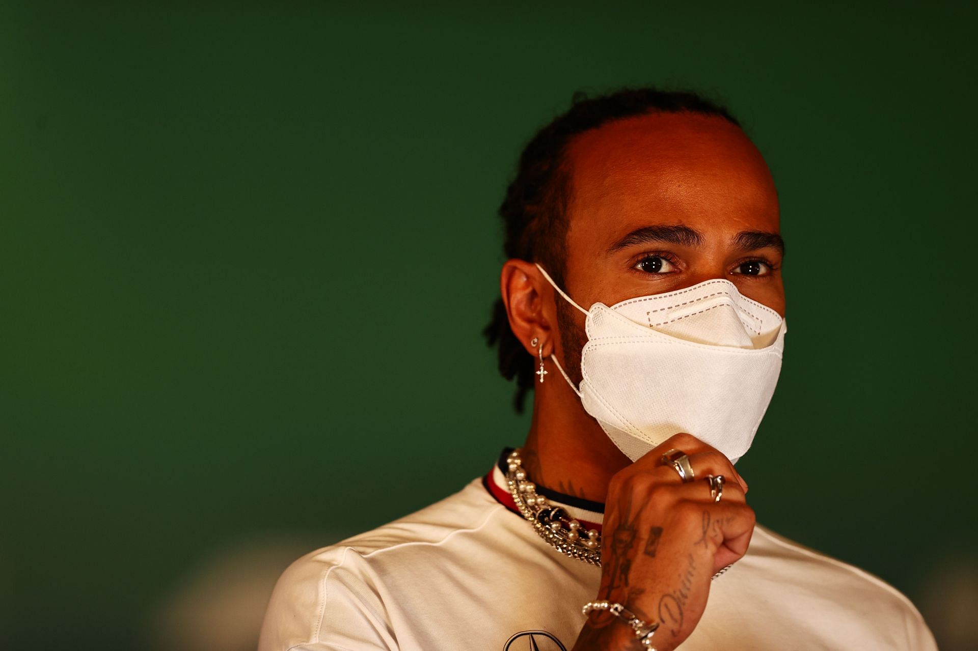 Lewis Hamilton looks on in the paddock during 2021 Qatar Grand Prix free practice. (Photo by Mark Thompson/Getty Images)