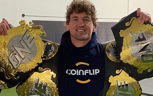 Ben Askren poses with his belts from One Championship and Bellator. Image credits: Instagram/benaskren